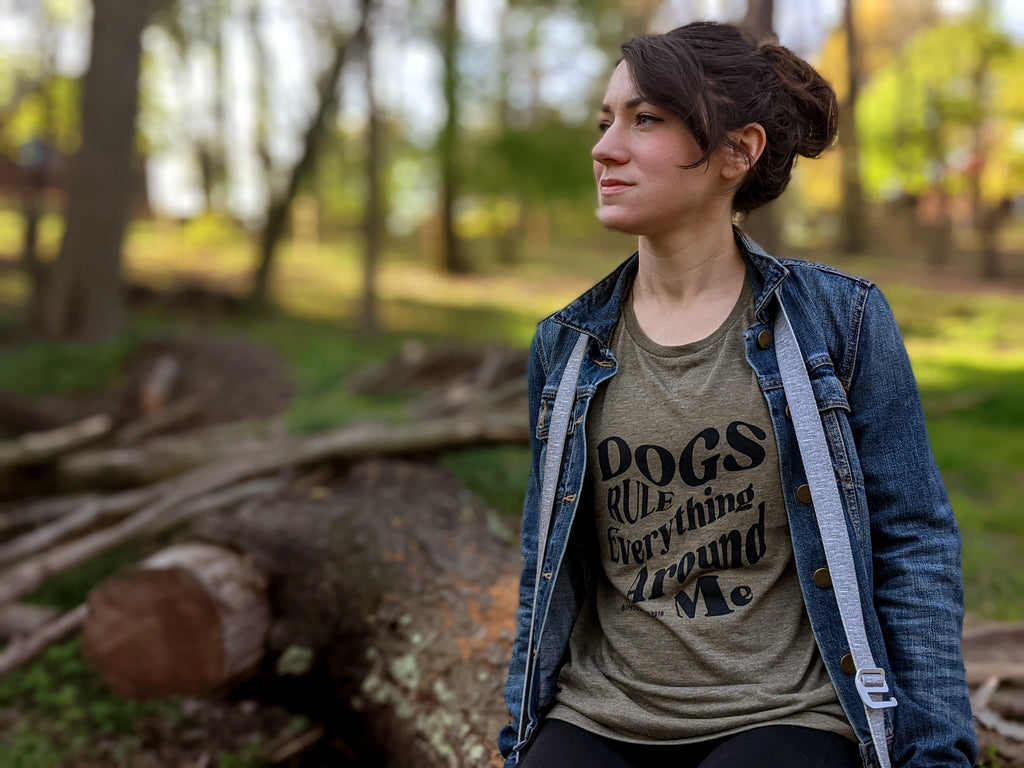 Woman wearing 'Dogs Rule Everything Around Me' tank top