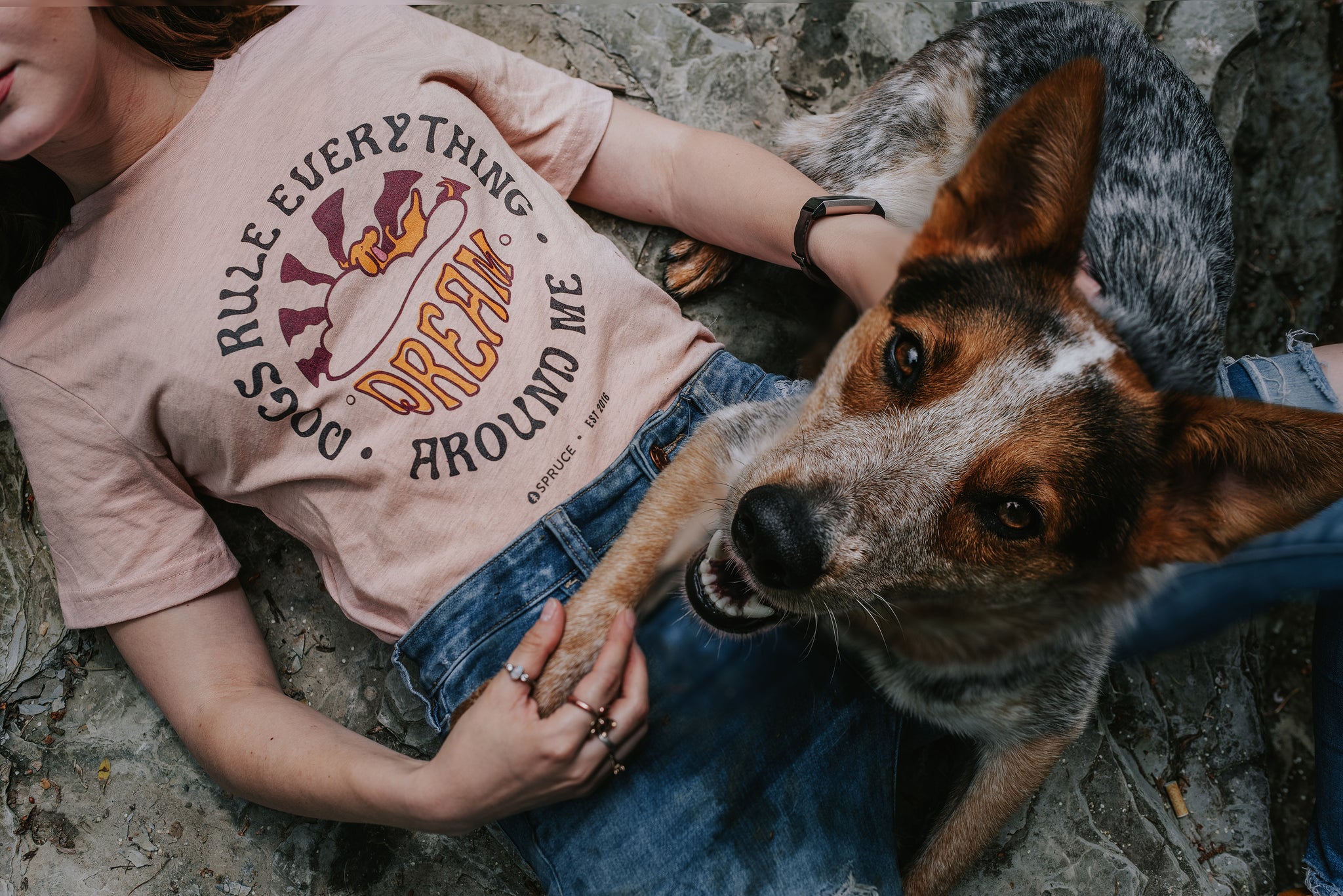 Woman wearing dog 'DREAM' t-shirt with her dog 